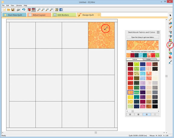 Click in the Fabrics palette on a fabric or color. Then click on the layout.